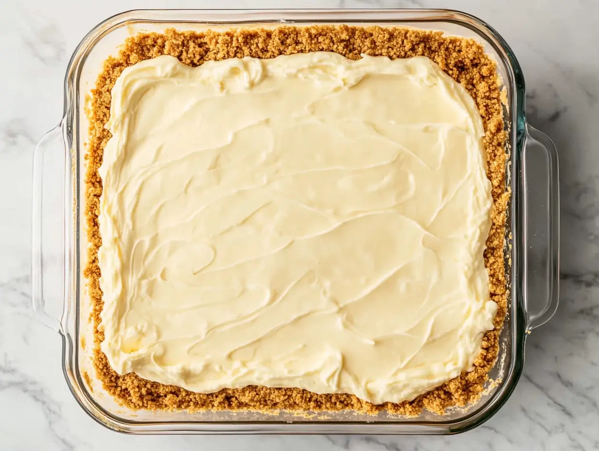pecan-pie-lasagna-step2 Graham crust layer for pecan pie lasagna with creme cheese